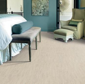 Bedroom scene with beige Infinity nylon carpet